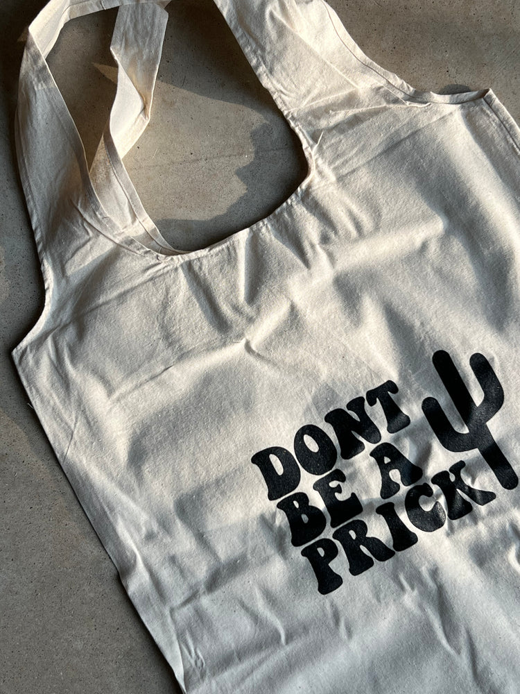 “Don’t Be a Prick” Tote Bags